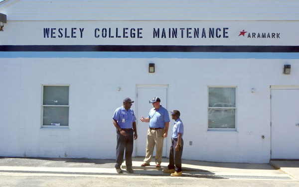 Wesley reduces Aramark's contract 14 percent